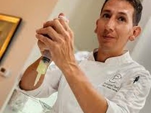 Chef Johan Garces plating a dish
