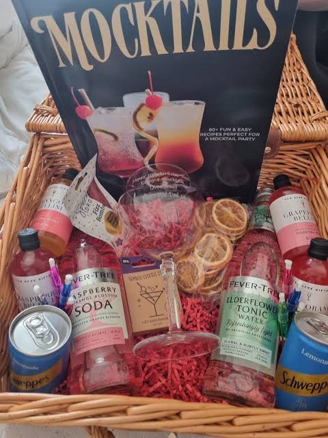 Gift basket of mocktail mixers, tonics and a recipe book